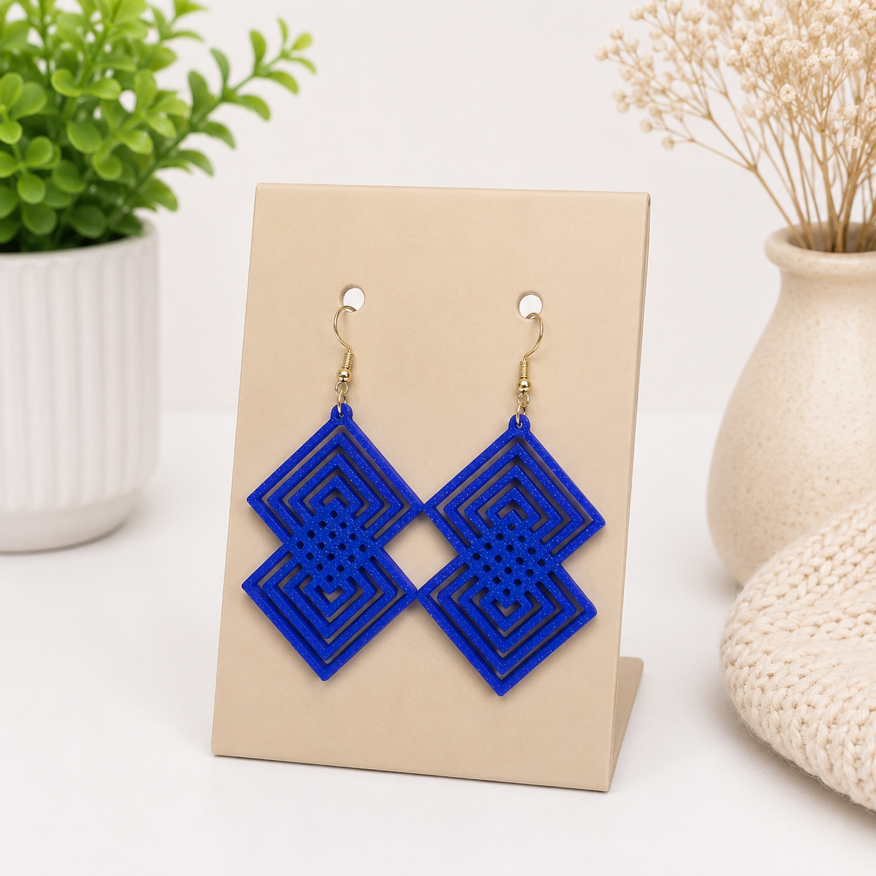 Aretes en forma de diamante doble