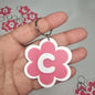 Llaveros de flor con letras