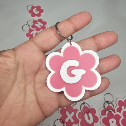 Llaveros de flor con letras