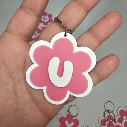 Llaveros de flor con letras